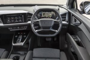 Audi Q4 sportback e-tron infotainment screen and steering wheel interior