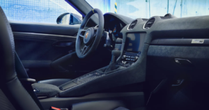 Porsche 718 cayman gt4 rs interior passenger side view of drivers controls