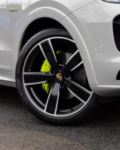 2022 Porsche Cayenne SUV exterior in crayon, optional extra black alloys with yellow calipers